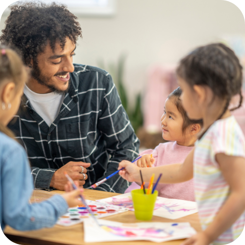 Sitter with children smiling